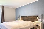 Schlafzimmer mit Doppelbett - Wohnung 39 - Top-Hundeurlaub