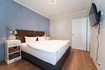 Schlafzimmer mit Doppelbett - Wohnung 11 - Top-Hundeurlaub
