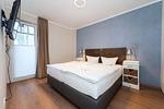 Schlafzimmer mit Doppelbett - Wohnung 11 - Top-Hundeurlaub