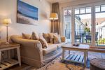 Wohnbereich mit Blick zum Balkon - Wohnung 44 - Top-Hundeurlaub
