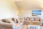 Wohnbereich mit Sofa - Wohnung 63 - Top-Hundeurlaub