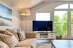 Wohnzimmer mit Fernseher - Wohnung 63 - Top-Hundeurlaub