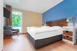 Schlafzimmer mit Doppelbett - Wohnung 43 - Top-Hundeurlaub
