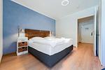 Schlafzimmer mit Doppelbett - Wohnung 43 - Top-Hundeurlaub