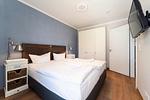 Schlafzimmer mit Doppelbett - Wohnung 05 - Top-Hundeurlaub