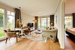 Wohnzimmer mit Blick zur Terrasse - Wohnung 18 - Top-Hundeurlaub