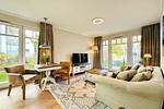 Wohnbereich mit TV - Wohnung 18 - Top-Hundeurlaub