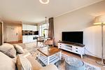 Wohnzimmer mit Blick zur Küche - Wohnung 18 - Top-Hundeurlaub