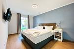 Schlafzimmer mit Doppelbett - Wohnung 18 - Top-Hundeurlaub