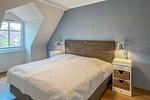 Doppelbett im Schlafzimmer - Wohnung 48 - Top-Hundeurlaub
