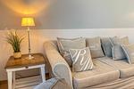 Wohnzimmer mit Couch und Sesseln - Wohnung 54 - Top-Hundeurlaub