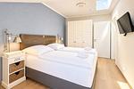 Schlafzimmer mit Schrank - Wohnung 64 - Top-Hundeurlaub