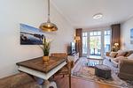 Wohnzimmer mit Esstisch - Wohnung 42 - Top-Hundeurlaub