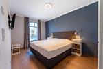 Schlafzimmer mit Doppelbett - Wohnung 42 - Top-Hundeurlaub