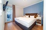 Schlafzimmer mit Doppelbett - Wohnung 34 - Top-Hundeurlaub