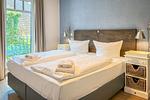 Schlafzimmer mit Doppelbett - Wohnung 23 - Top-Hundeurlaub