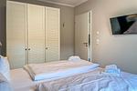 Schlafzimmer mit Kleiderschrank - Wohnung 23 - Top-Hundeurlaub