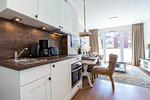 Wohnzimmer mit Blick zur Terrasse - Wohnung 25 - Top-Hundeurlaub