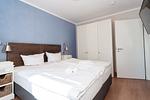 Schlafzimmer mit Doppelbett - Wohnung 25 - Top-Hundeurlaub