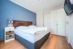Schlafzimmer mit Doppelbett - Wohnung 47 - Top-Hundeurlaub