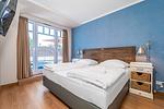 Schlafzimmer mit Doppelbett - Wohnung 47 - Top-Hundeurlaub