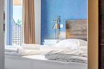 Schlafzimmer mit Doppelbett - Wohnung 47 - Top-Hundeurlaub