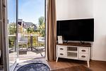 Wohnbereich mit TV - Wohnung 27 - Top-Hundeurlaub