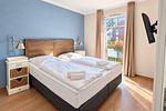 Schlafzimmer mit Doppelbett - Wohnung 27 - Top-Hundeurlaub