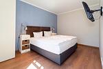 Schlafzimmer mit Doppelbett - Wohnung 16 - Top-Hundeurlaub