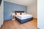 Schlafzimmer mit Doppelbett - Wohnung 38 - Top-Hundeurlaub