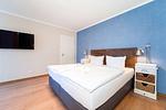 Schlafzimmer mit Doppelbett - Wohnung 38 - Top-Hundeurlaub