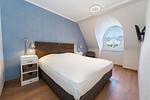 Schlafzimmer mit Doppelbett - Wohnung 60 - Top-Hundeurlaub