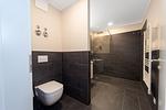 Badezimmer mit Dusche und WC - Wohnung 60 - Top-Hundeurlaub