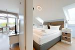 Blick vom Flur zum Wohnzimmer und Schlafzimmer - Wohnung 67 - Top-Hundeurlaub