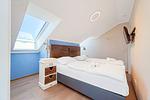 Schlafzimmer mit Doppelbett - Wohnung 67 - Top-Hundeurlaub