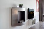 Wohnzimmer mit Blick auf TV und Bioethanol Kamin - Promenadenvilla 03 Wohnung 06 - Top-Hundeurlaub