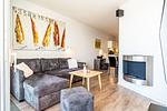 Wohnzimmer mit Sofaecke - Promenadenvilla 03 Wohnung 02 - Top-Hundeurlaub