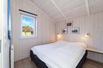 erstes Schlafzimmer mit Doppelbett - Ferienhaus 03 - Top-Hundeurlaub