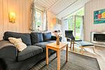 Wohnzimmer mit Sofaecke - Ferienhaus 18 - Top-Hundeurlaub