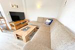 Fernseher in Sitzecke in Loddin auf Ferienwohnung auf Usedom - Ferienwohnung kleine Auszeit - Top-Hundeurlaub