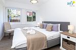 Schlafzimmer - Ferienwohnung Border Suite - Top-Hundeurlaub