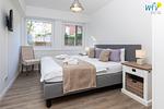 Schlafzimmer - Ferienwohnung Border Suite - Top-Hundeurlaub
