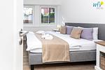 Schlafzimmer - Ferienwohnung Border Suite - Top-Hundeurlaub