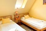 Freundliches Gästezimmer mit zwei Einzelbetten in Kölpinsee - Ferienwohnung 3 - Top-Hundeurlaub