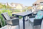 Sonniger Balkon mit Blick über die Ferienanlage in Kölpinsee - Ferienwohnung 3 - Top-Hundeurlaub