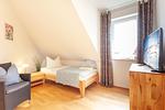 Schlafzimmer - Haus: Kamin, Garten - Top-Hundeurlaub