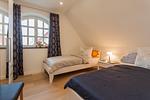 Schlafzimmer - Haus: Terrasse, Kamin, eigene Sauna - Top-Hundeurlaub