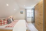 Schlafzimmer - Haus 1: Sauna, Boddenblick - Top-Hundeurlaub