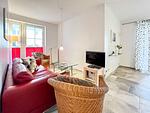 Wohnzimmer mit TV - Wohnung 03 - Top-Hundeurlaub