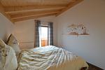 Schlafzimmer - Augusta - Feriendorf Via Claudia Haus 70 - Top-Hundeurlaub